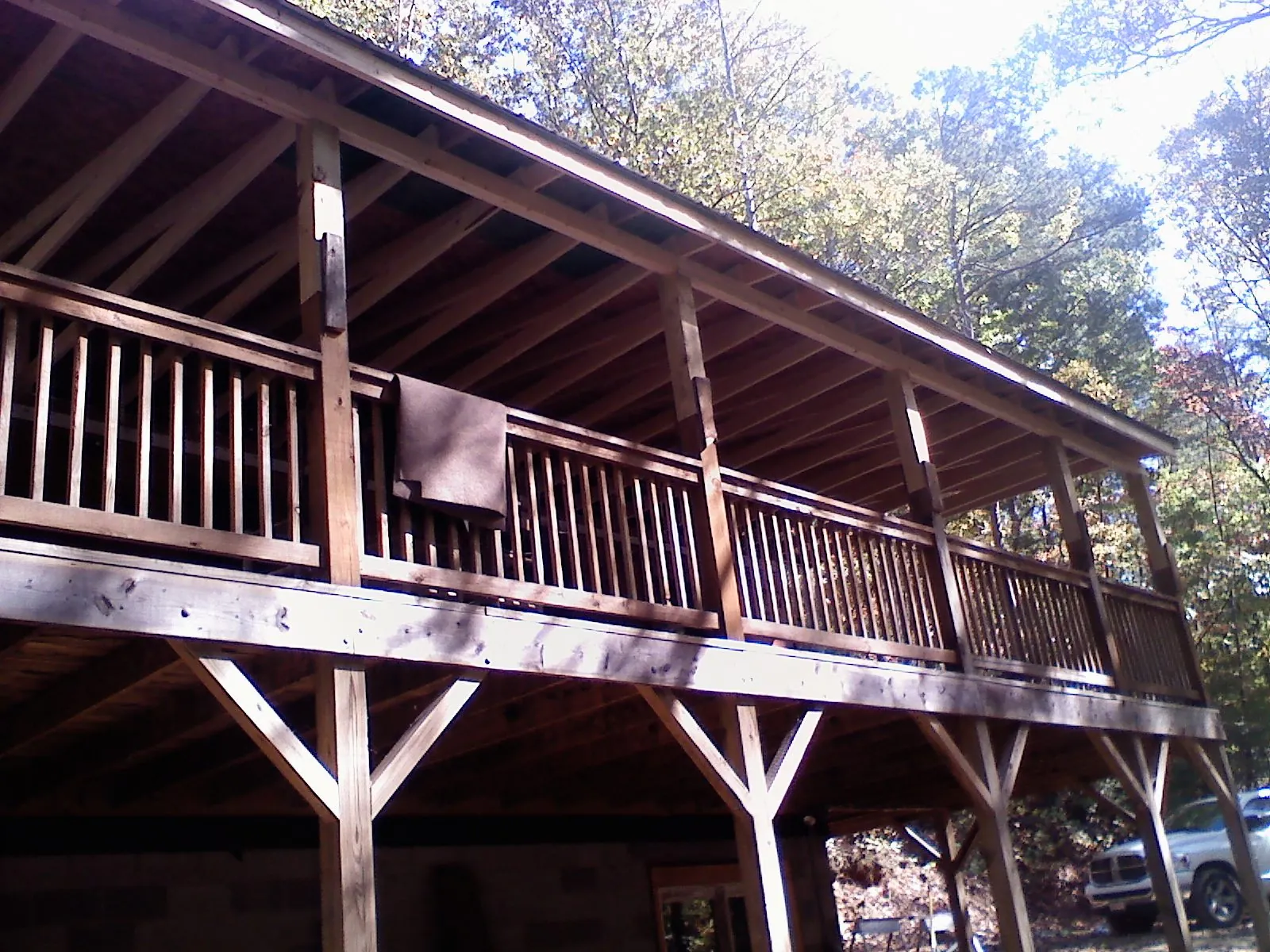 Timber framing under a new elevated porch and deck — Roof Leak Repair in Claymont by Roofing Brothers